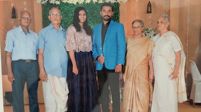 Mr. T.A. Pathrose Tholanikunnel at a grandchild&rsquo;s wedding with his brother and sisters, Paulose, Saramma and Dr. Kunjamma